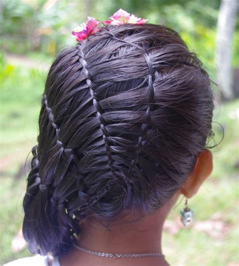 I love when talent and imagination all comes together to portray art like this. Braids & Hairstyles for Super Long Hair: Micronesian Girl ...