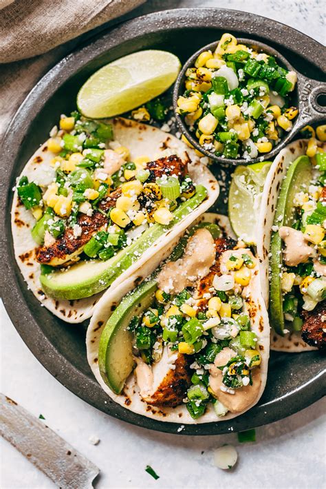 Tacos always seem to be pitched as a quick 'n easy dinner. Mexican Street Corn Chicken Tacos Recipe - Little Spice Jar