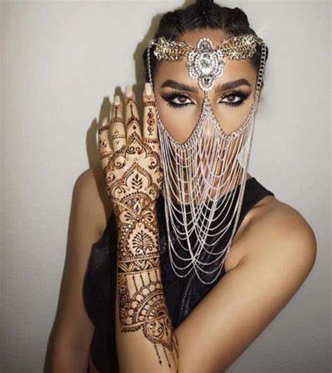 Some people also strongly believe that henna can help to guard against ill fortunes and the evil eye , particularly when designs incorporate the hamsa , an eye, or diamond shapes. laylamashallah | Diamond face, Henna, Face jewellery