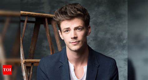 grant gustin reacts to hartley sawyer s firing from the flash for racist tweets times of india
