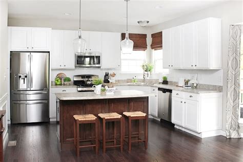 Generally, most homeowners use the same color of the cabinets for the kitchen island, but they either tone it down to a lighter shade or intensify it to a darker shade. 1 Year House Anniversary + Video Tour - How to Nest for Less™