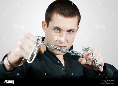 Angry Man And Chains Hi Res Stock Photography And Images Alamy