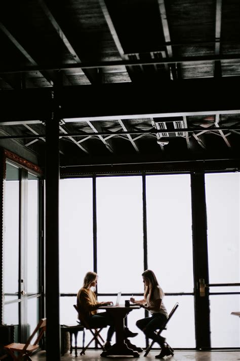 Two Women Talking Pictures Download Free Images On Unsplash