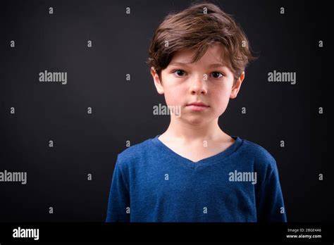 Face Of Young Handsome Boy Looking At Camera Stock Photo Alamy