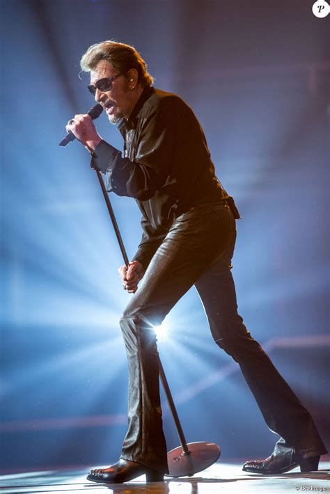 Few european artists have loved american pop culture as much as french rocker johnny hallyday. Exclusif - Le rockeur Johnny Hallyday en concert à l'Arena ...