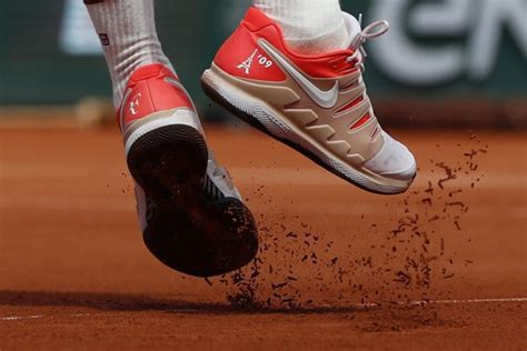 Back on tour in Paris, Federer keeping an eye on the present