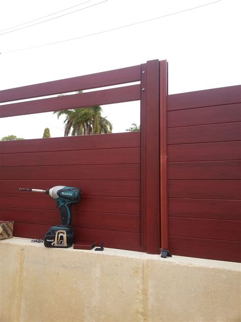 Chain link fence slats do a fantastic job to secure property lines, and safely keep young children and pets within your yard. Jarrah Jungle: Courtyard Project - How To Install Fence Slats