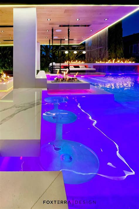 This Luxury Pool Design Has A Practically Hidden Swim Up Bar With Clear