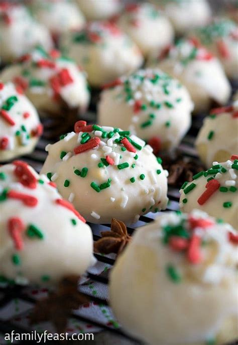 Water in a large bowl until smooth (glaze should be the consistency of heavy cream; Italian Anisette Cookies - A Family Feast®