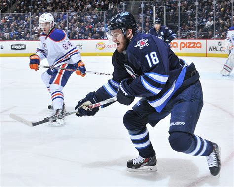 Make profit while watching your favourite hockey matches. Edmonton Oilers V Winnipeg Jets Photograph by Lance Thomson