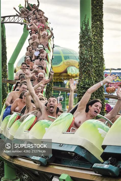 Naked Thrill Seekers Ride The Green Scream Roller Coaster On A Very