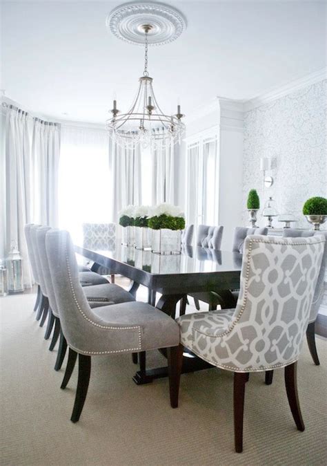 A grey dining room is a strong theme that oozes sophistication, unquestionable confidence, and a serious sense of style. Gray Dining Chairs - Transitional - dining room - Lux Decor
