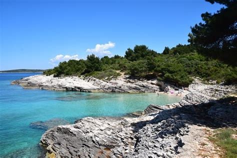 Cognate to (baltic) latvian kàmpju, kàmpt; 18_Badestrand-Naturpark-Kap-Kamenjak-Istrien-Kroatien.jpg ...