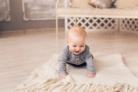 Little Baby Boy Crawling On The Floor At Home Stock Image Image Of