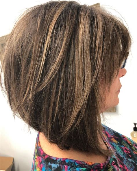 A recent survey has shown that women who are approaching 50 or have 4. Messy Inverted Brown Lob | Modern hairstyles, Hair styles ...