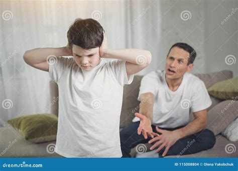 Irritated Father Screaming At His Son Stock Photo Image Of Despair