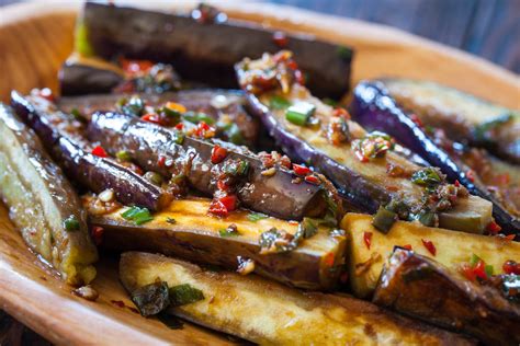 Heat the oil in a wok or large heavy based skillet over high heat until it is smoking. Chinese Eggplant with Spicy Garlic Sauce | KeepRecipes ...