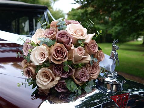 Hand Tied Bouquet Using Amnesia And Quicksand Roses Eucalyptus Rose