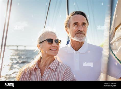Portrait Of Two Senior People Looking Away Mature Couple Standing On