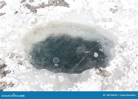 The Hole Is Frozen In The Ice Of The Lake Stock Image Image Of