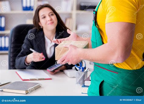 The Postman Delivering Parcel To The Office Stock Image Image Of