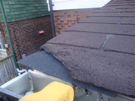 Cost to fix roof leak by location. Roof Repair | Tar and gravel roof leak around chimney, ice ...