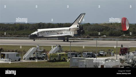 Nasas Space Shuttle Discovery Touches Down On Runway 15 At The