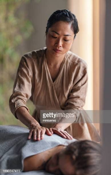 Asian Massage Therapist Photos And Premium High Res Pictures Getty Images
