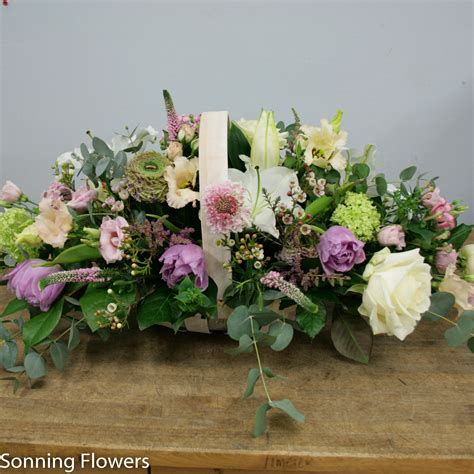 Fromyouflowers.com has been visited by 10k+ users in the past month Basket of flowers - funeral tribute | Sonning Flowers