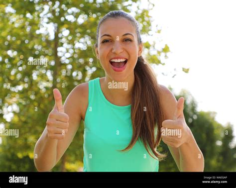 Super Woman Portrait Of Winner Girl Showing Thumbs Up Positive Smiling Fitness Healthy Woman