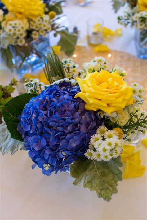 Yellow Rose And Blue Hydrangea Centerpiece With White Aster