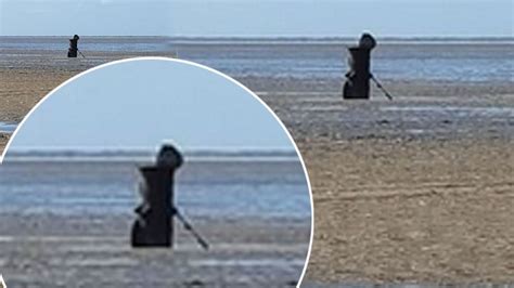 Is This The Grim Reaper Dad Spooked After Kids Spot Hooded Figure On
