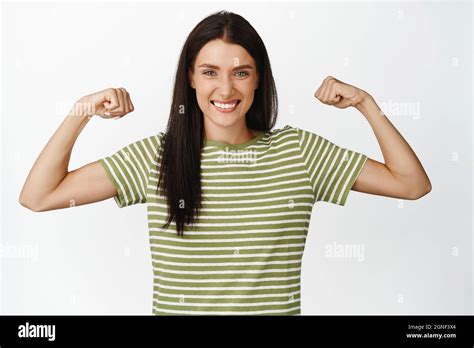 Young Girl Flexing Muscles Hi Res Stock Photography And Images Alamy