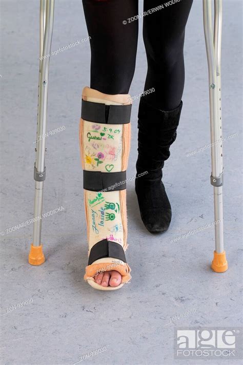 Woman With Leg Cast And Crutches In Hospital Stock Photo Picture And