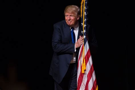 donald trump hugged the american flag again