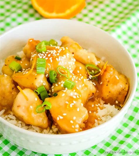 Chinese orange chicken made with crispy fried chicken covered in an authentic orange sauce. Tasty Baked Orange Chicken (Easy!) - Creations by Kara