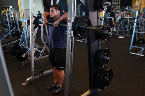 Smith Machine Upright Row Exercise Guide And Video