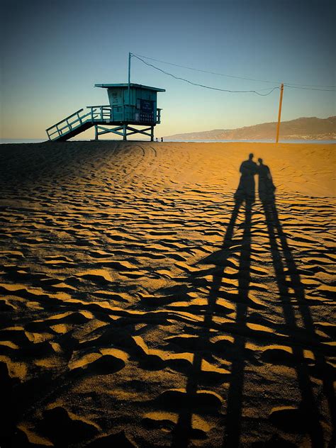 Shadows On The Beach Photograph By Ken Woo Fine Art America