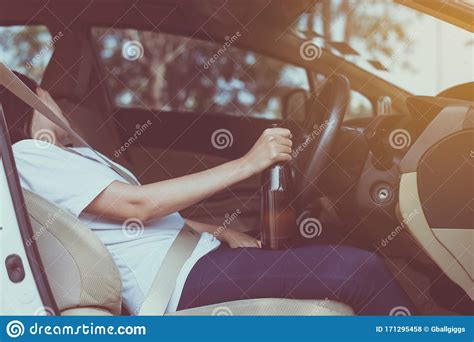 Dangerous Driving Conceptdrunk Asian Woman Drinking Alcohol While Driving Car On Roadwomen
