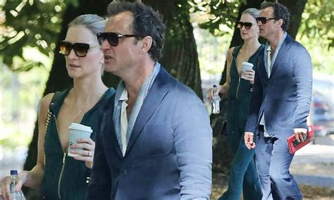 Jude Law Looks Dapper In A Navy Suit As He Joins Wife Phillipa Coan