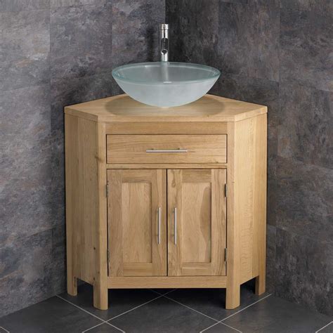 Underneath, you'll find plenty of space for adding your toiletries or if you have a tiny bathroom in the corner of your home, you'll love adding this small corner sink vanity into the space. 420mm Round Frosted Glass Basin + Alta Two Door Oak Corner ...