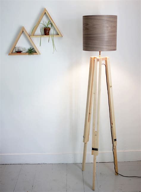 Remove the base of the candle holders and then fit them around the basic pendant light kits. DIY Tripod Floor Lamp - The Merrythought