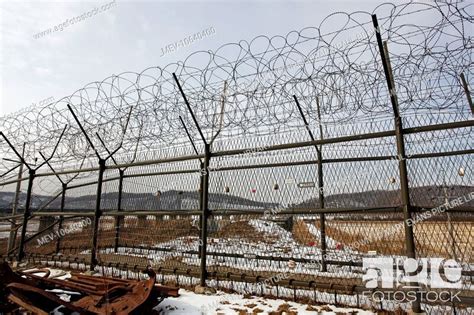 Barbed Wire Fencing And Barrier Fence At The Dmz De Militarised Zone