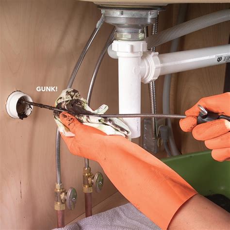 How To Unclog A Sink Drain With A Plunger Drain Snake Family Handyman