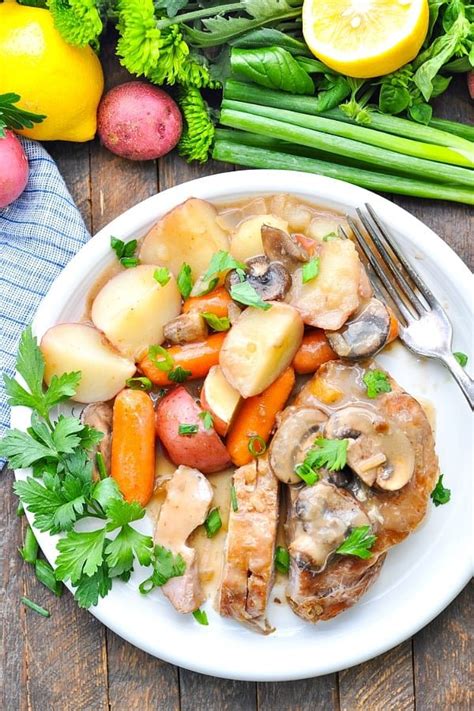 Learn how to prepare slow cooked pork chops in your crock pot that are most and tender with an amazing sauce. Slow Cooker Pork Chops with Vegetables and Gravy - The Seasoned Mom