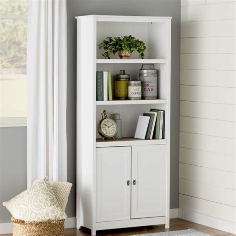 Made of poplar solids and birch veneers, this sturdy, large bookcase complements any room, from office to living room; August Grove Albin 72" Standard Bookcase & Reviews | Wayfair