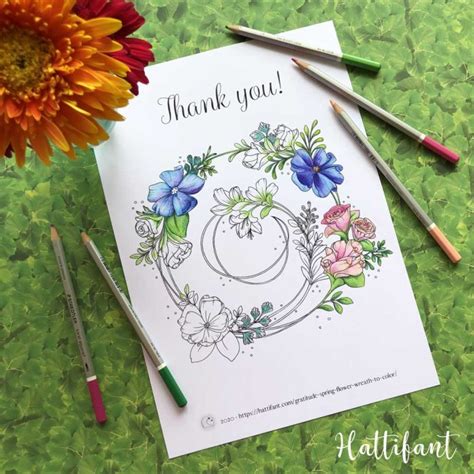 De bloemenkrans preikt centraal op dit unieke ontwerp. Hattifant-gratitude-spring-flower-wreath-coloring-page ...
