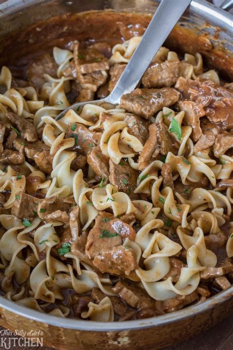 Warm up with one of our comforting beef stew recipes. Steakhouse Beef Tips with Noodles - This Silly Girl's Kitchen