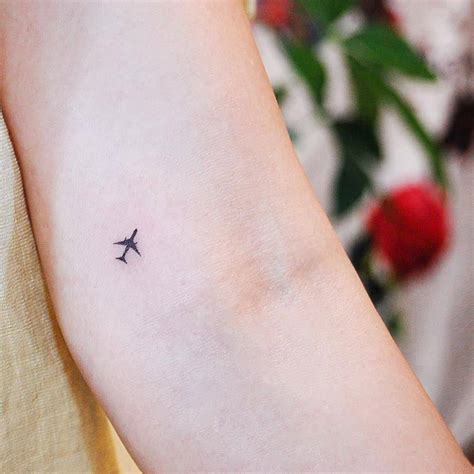 Minimalist Airplane Tattoo On The Inner Arm