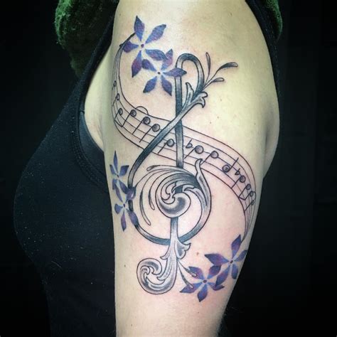 75 Best Music Tattoo Designs And Meanings Notes And Instruments 2019